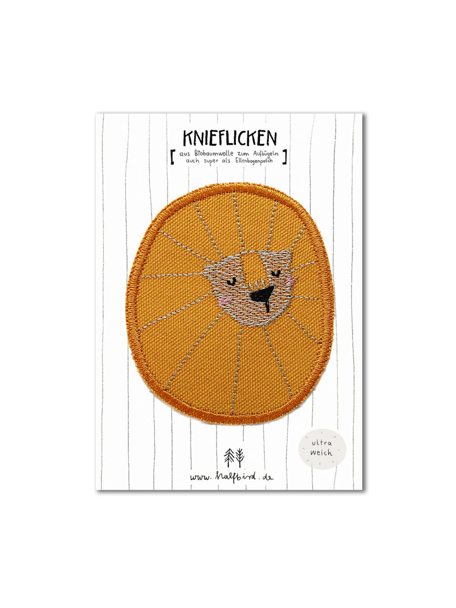 Knieflicken Löwe als Bügeflicken oder Ellenbogenpatch in gelb auf einer Karte