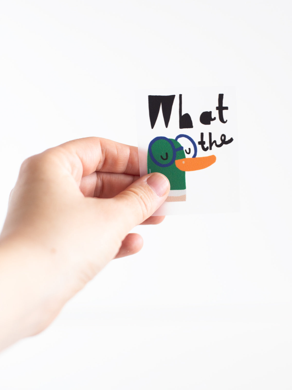 Hand mit randlosem Bügelbild What the duck von Halfbird