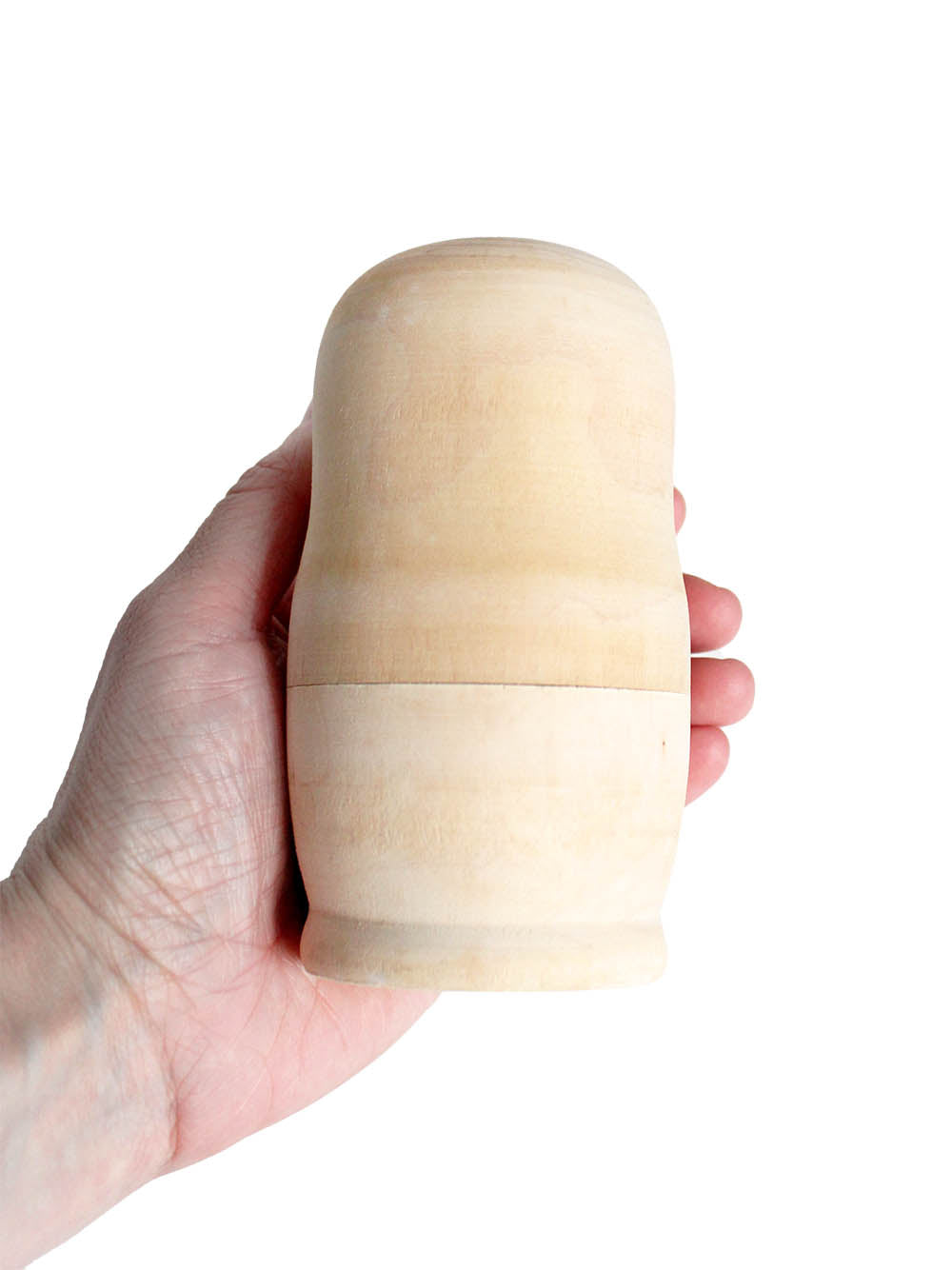 Matroschka Rohling unbemalt in der Hand