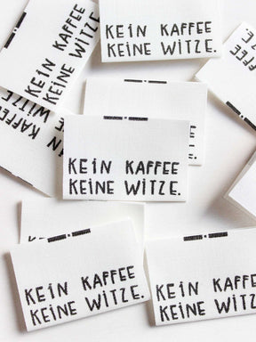 Label für Kleidung aus Biobaumwolle kein kaffee keine witze